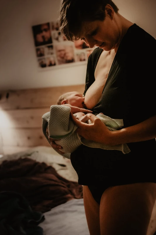 Newborn baby breast feeding 
